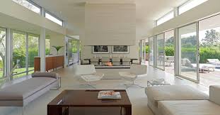 Stone siding and a metal roof combine to give this contemporary home plan its curb appeal.the amazing floor plan is wide open so that the views flow from room to. How To Design Around A Central Fireplace So Everything Is In Sync