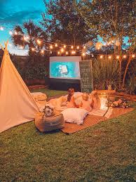Skip the drive in movie theater and create an outdoor movie theater in your backyard! Backyard Movie Night At Home For Summer Life By Leanna