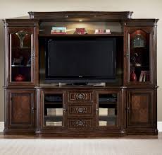 An entertainment center, also known as a wall unit or entertainment unit, is a piece of furniture that includes shelves and drawers, perfect for storing major electronic items such as consoles, a tv, satellite/cable receiver, and cords. Tv Entertainment Wall Units Novocom Top