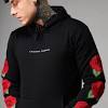 The floral pattern is made up of majestic red and orange flowers with green leafs. 1
