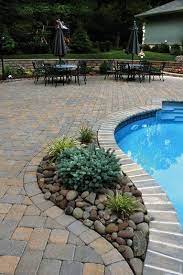 Create the classic look of italian travertine at a fraction of the cost — or create a design all your own. Roman Cobble Standard Paver By Cst Backyard Pool Landscaping Pool Landscaping Pavers Backyard