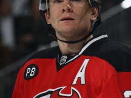 Who among the Devils contributes most to Corsi? Whose passes result in  shots more often?