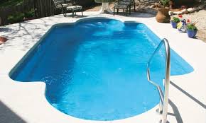 Light Blue Refreshing Roman Style Fiberglass Pool With Basic White Style Concrete Decking Leisure Pools Fiberglass Pools Swimming Pools Inground