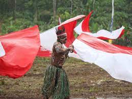 Di bagian kibar, burung surga raggiana menjadi siluet. Tentara Papua Nugini Minta Bendera Merah Putih Diturunkan News Liputan6 Com