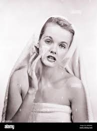 Woman 1960s mirror hi-res stock photography and images