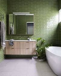 A monochromatic green palette brightens a classic bath. Fresh And Modern Green Bathroom Design Ideas