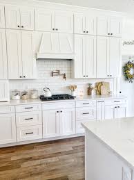 Very simple usage of three colors and it looks stunning. Revival Home Designs Kitchen White Shaker Kitchen Cabinets White Shaker Kitchen Kitchen Style