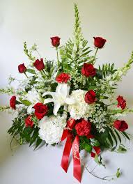 We offer unique, local products and a distinctive approach to design and service. Red And White Table Arrangement By Jp Parker Flowers