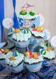 Setting up an actual tiki bar with coconut and pineapple cups filled with punch or lemonade is also a great addition to the pool party theme. Beach Ball Pool Party Birthday Bash Press Print Party