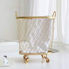Check out our gold laundry basket selection for the very best in unique or custom, handmade pieces from our baskets shops. Laundry Basket On Wheels Loft Metal Storage Basket With Handle Gold Black Wire Organizer Bask Laundry Basket On Wheels Bathroom Organisation Washing Basket