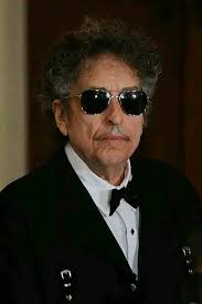 Thought y'all might like this with Bob playing the guitar with hubby Yogi  Cole .. many many years ago !!