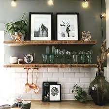 Or, add a little sophistication to the bedroom—glass bottles can be an elegant solution. Metrofliesen Und Tolle Deko Accessoires In Der K Che Decorating Styles Decor Styles Decor Trendy Kitchen Tile Wood Shelves Kitchen Cabinet Decor