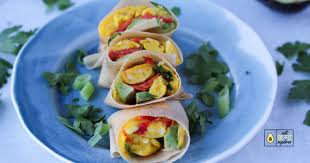 Warm tortillas are filled with scrambled eggs, smoked salmon, and more. Ghgyuambikgo4m