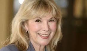 Susan rolls up her sleeves for realism