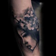 Black and white is prominent in this tattoo that depicts the darkness of night, yet brightened with the glow of the full moon. 45 Elegant Cherry Blossom Tattoo Designs Of 2020