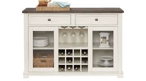 A sideboard is ideal for storing your dining accessories while still making a décor statement. Servers Rooms To Go Keston White Server 42814005 Dining Room Buffet Dining Room Essentials Dining Room Storage