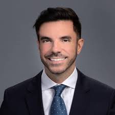 September 6, 2003: University of Miami receiver Sinorice Moss breaks into  the open field while being pursued by University of Florida linebacker  Channing Crowder. Led by former UF quarterback Brock Berlin, the