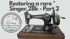 Image result for singer 28k