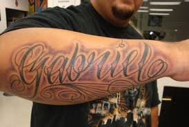 Esma name with rose tattoo on right arm. 44 Kids Name Tattoos