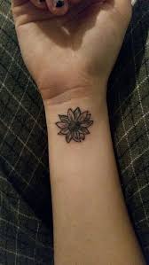 52 Small Sunflower Tattoo Ideas And Images Piercings Models Sunflower Tattoo Simple Sunflower Tattoo On Wrist Flower Wrist Tattoos