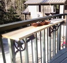 Your small outdoor living spaces can look cozier when decorated with natural decorations like railing planters filled with summer flowers and green plants. Kulshan Diy Balcony Railing Table Bracket Set For Deck Bars Etsy