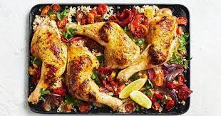 This Easy One Pan Tray Bake Combines Chicken Marylands Feta Couscous Tomatoes And Peppers For A Truly Fl Chicken Tray Bake Feta Chicken Roast Chicken Dinner