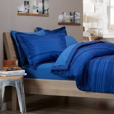 Stunning navy blue luxury bedroom decor with blue velvet. 11 Cool Heavenly Blue Comforters For A Peaceful Bedroom