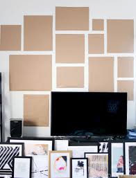 How To Plan And Hang A Gallery Wall Homey Oh My Photo Wall Gallery Tv Gallery Wall Gallery Wall Living Room