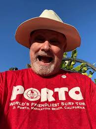 On the right is a restored Hobie Corky Carroll Mini Model from 1967. On the  left, one of Corky's favorite templates, his Blue Mango Prowler square  Diamond tail. Here's a photo of