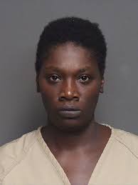 Mother charged with murder after 8-year-old boy found dead in attic