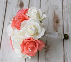 Maybe you would like to learn more about one of these? Floramatique Natural Touch Orange Coral Roses Bouquet