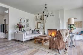 The best living room decorating ideas under windows. Modern French Country Home Offers Breathtaking Interiors In Calgary
