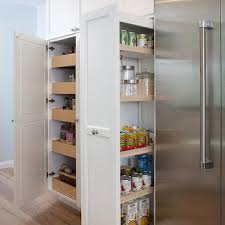 These products are designed to fit into your existing cabinets (check the measurements first!) and can be used to store everything from spices to pots and pans to small appliances. Floor To Ceiling Pull Out Pantry Cabinet Design Ideas