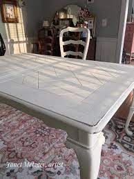 On day two i took my can of annie sloan clear chalk paint wax and applied one coat on the chairs, the fabric seat cover and the whole table. Painting A Dining Room Set With Chalk Paint The Purple Painted Lady