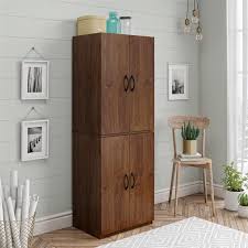 If you can't add more actual storage cabinets to your living space, you can always increase the capacity of what's already there. Mainstays 4 Door Storage Cabinet Dark Chocolate Walmart Com In 2020 Tall Cabinet Storage Home Storage Cabinets Door Storage