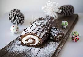 Yule Log Buche De Noel Is A Traditional Christmas Dessert Chocolate Cake With Whipped Cr Yule Log Recipe Traditional Christmas Desserts Buche De Noel Recipe