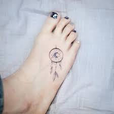 Feathers of different birds were rich in symbolic meanings in different cultures. Watercolor Dreamcatcher Tattoo On The Foot