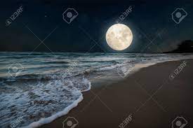 The full moon appears at night with all its might and erases all the stars from the sky! Beautiful Nature Fantasy Romantic Beach And Full Moon With Stock Photo Picture And Royalty Free Image Image 145657112