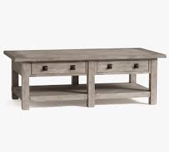One coffee table, one end table, one side table. Benchwright Rectangular Wood Coffee Table With Drawers Seadrift 54 L Pottery Barn