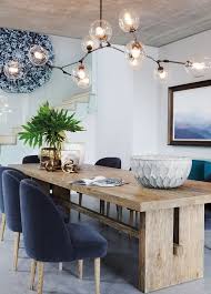 You may wish to hang an attractive black chandelier above your dining table or kitchen table, offering enough lighting for mealtime and projects as well as a lovely ceiling. Ursa Dining Room Design Modern Dining Room Dining Table Lighting