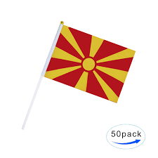 The flag of north macedonia is the national flag of the republic of north macedonia and depicts a stylized yellow sun on a red field, with eight broadening rays extending from the center to the edge of the field. Kind Girl Hand Held Macedonia Flag Macedonian Flag Stick Flag Small Mini Flag 50 Pack Round Top National Country Flags Party Decorations Supplies For Parades World Cup Sports Events Celebration Buy Online In Botswana At Botswana Desertcart Com