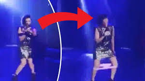 Performer left red-faced as pink knickers drop down by her knees on stage -  Daily Star