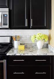 However, as kitchen design and cabinetry preferences have evolved to include open shelves or even no upper storage, backsplashes and tile designs for kitchens have changed as well. Subway Tile Backsplash Ideas With Dark Cabinets Novocom Top