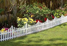 Picket fences are a type of fence often used decoratively for domestic boundaries, distinguished by their evenly spaced vertical boards, the pickets, attached to horizontal rails. Great Ideas Set Of 4 Mini White Garden Picket Fence Panels Wood Effect Plastic Lawn Edging For Plant Borders And Flowerbeds Buy Online In French Guiana At Frenchguiana Desertcart Com Productid 49647303