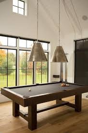 Game Room Features A Paneled Cathedral Ceiling Lined With Two Goodman Hanging Lamps Suspended Over A Poo Game Room Lighting Pool Table Lighting Pool Table Room