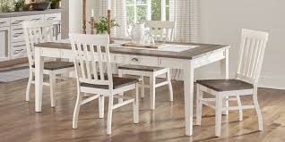 It's made from solid and engineered wood and features a white table and chairs in your choice of breezy neutral finish. White Dining Room Table Chair Sets