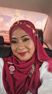 CPCE Graduates: Brother and Sister Siblings Romaul and Shania From  Essequibo with their mother Samantha at Friday's CPCE graduation.