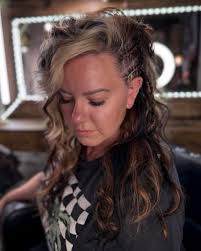 Are there any salons near Sanford, Florida that offer braiding services?