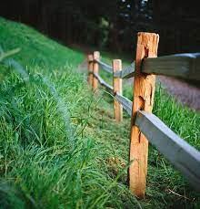 This will allow proper tension on all the horizontal line wires. Wooden Fence On Grassy Hillside Photograph By Danielle D Hughson
