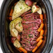 Remove the brisket to a platter and surround it with the vegetables. Slow Cooker Corned Beef And Cabbage Olivia S Cuisine